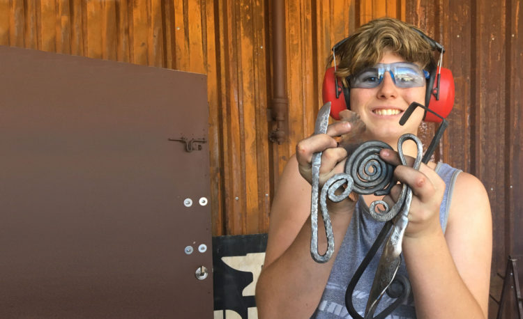 happy young blacksmith